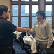 student practice shaking hands professionally